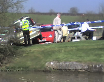 Police examining crashed car