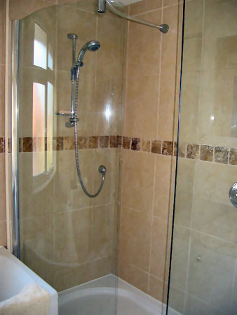 Walk-in shower enclosure