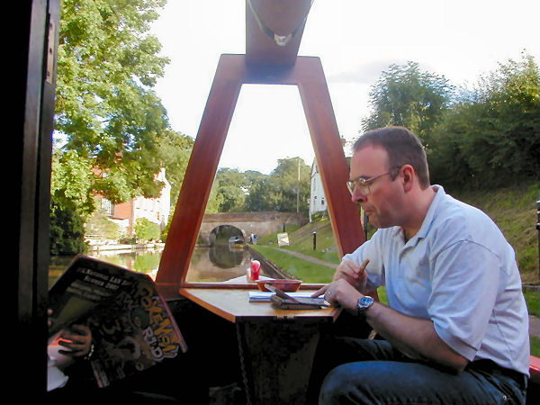 Andrew doing some planning and trying out the pork scratchings!