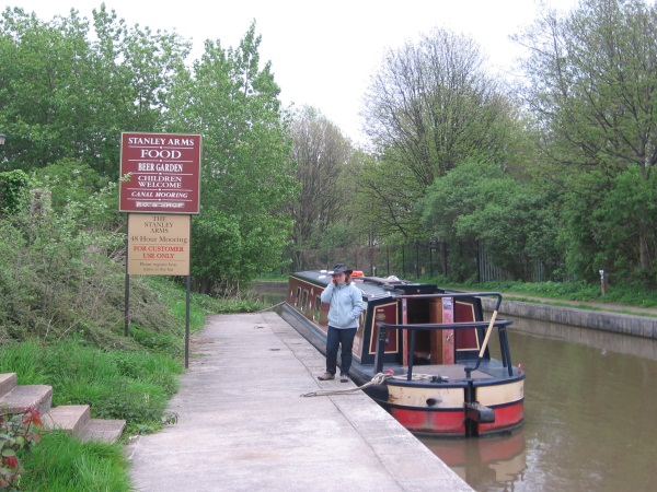 Narrowboat moored outside Stanley Arms pub