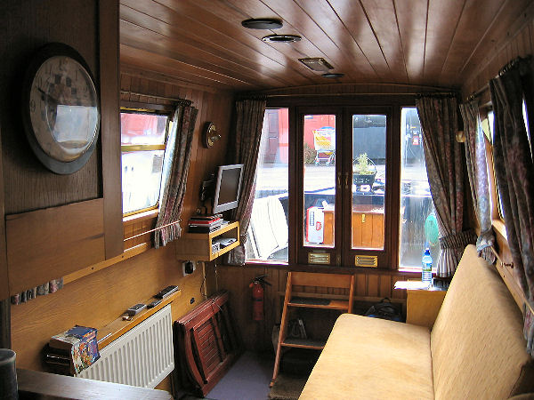 The new saloon layout with flatscreen TV and new sofa-bed